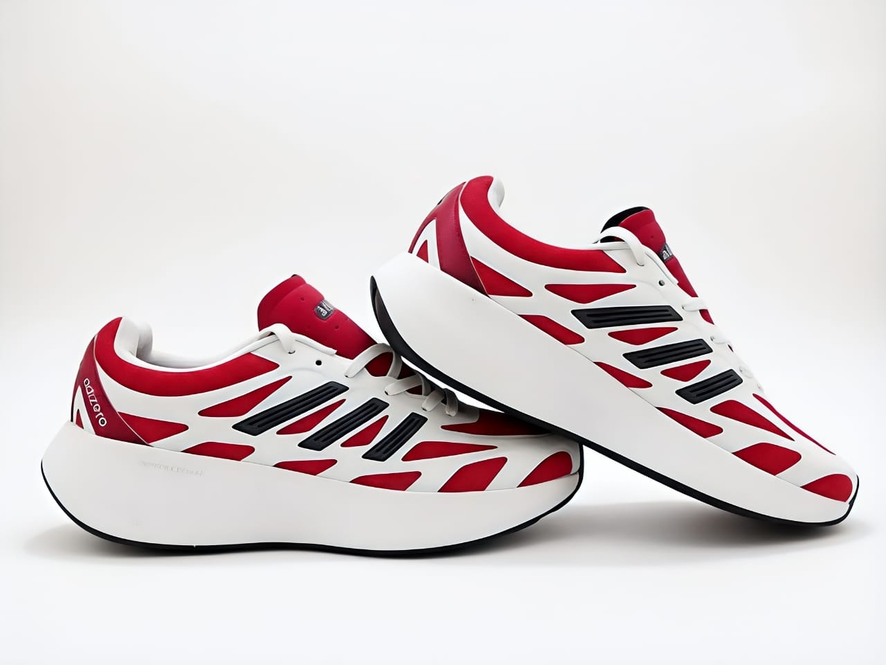 Adidas Adizero Aruku sneaker in the "White Pure Ruby" colorway.